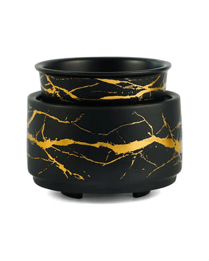 Black and gold electric wax melt burner with marble pattern, designed for melting candles or wax melts.